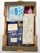 A box of new retail stock items - Keebab skewers, baby changing mats,