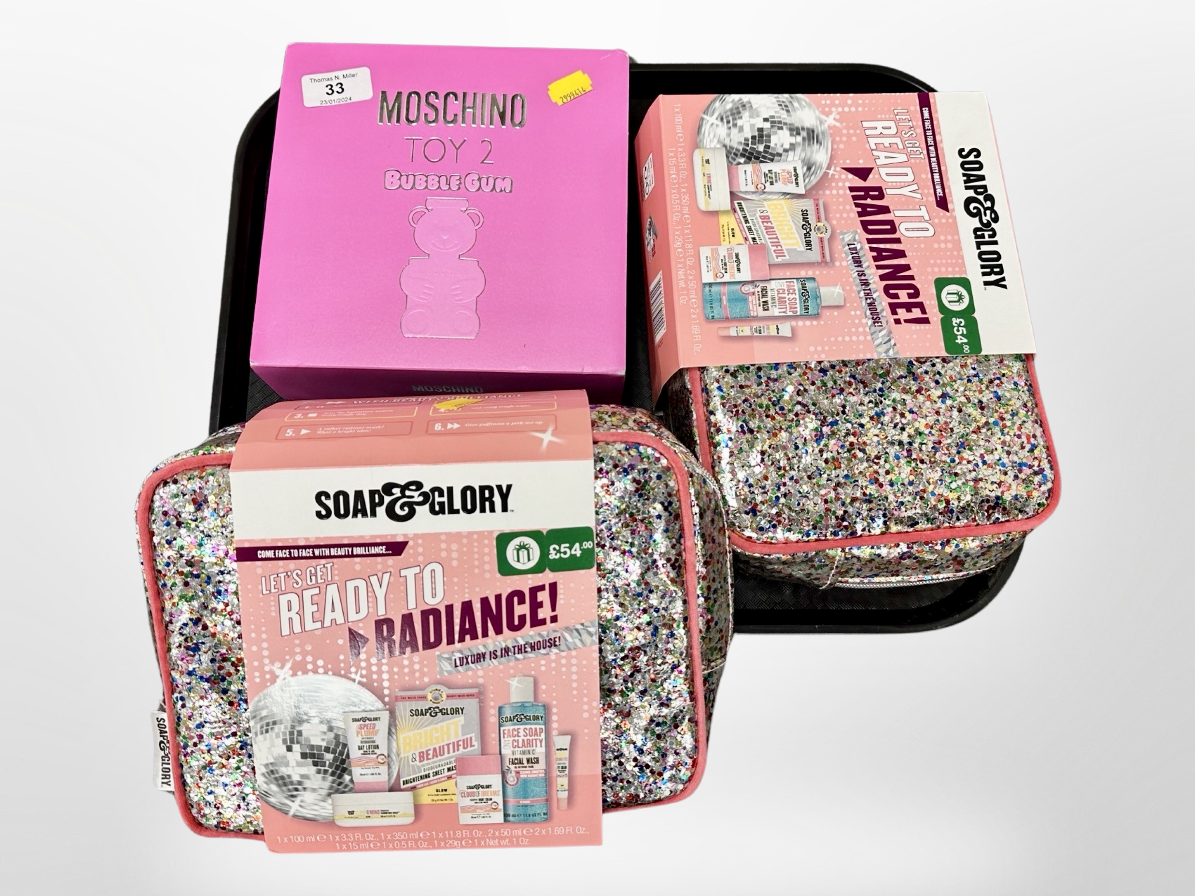 A Moschino Toy 2 Bubble Gum gift set, together with two Soap & Glory gift sets, all parts new.