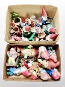 Two boxes of garden gnome figures