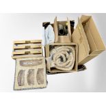 A box of new retail stock items - kitchen rack, ceramic ornament,