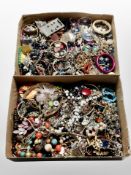 Two boxes of mixed costume jewellery : beads, bangles,