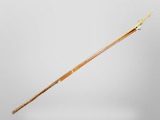 An antler handled walking stick and a swagger stick