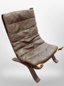 A 20th century Danish brown stitched leather bentwood framed chair