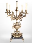 A continental gilt metal and marble five-sconce table lamp, height 73cm.