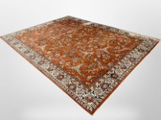 A machine-made carpet of Persian Saroukh design, 392 cm x 299 cm.