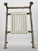 A brushed-gold coloured heated towel rail, 930mm x 620mm x 155mm, in retail condition.