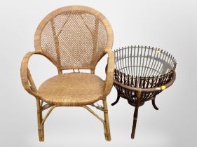 A wicker and glass occasional table and wicker chair
