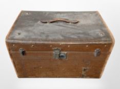 An early 20th century canvas luggage case