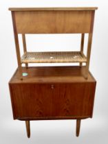 A 20th century Danish teak fall front entertainment cabinet,