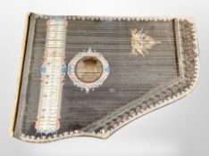 An antique guitar zither.