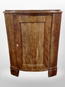A 19th century Danish mahogany single door corner cabinet,