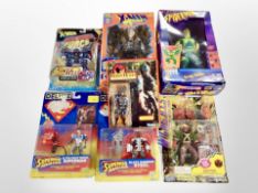 A group of Kenner and Toy Biz figurines, including Superman, Spider-Man, X-Men, etc.