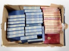 A box of Charles Dickens and Rudyard Kipling novels.