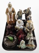 A collection of Chinese earthenware and resin figures