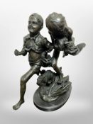 A bronze figure of two boys running on marble plinth, height 31cm.