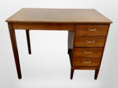 An early 20th century Danish walnut single pedestal writing desk,