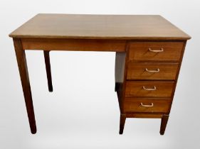 An early 20th century Danish walnut single pedestal writing desk,