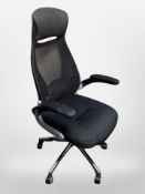 A contemporary mesh swivel office chair