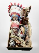 A box of Native American resin busts and figures, etc.