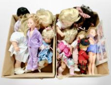 Two boxes of contemporary dolls.