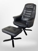 A black stitched leather armchair with matching footstool