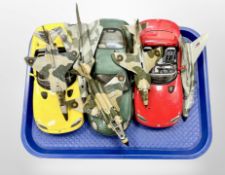A group of Burago die cast cars and similar Dinky aircraft