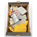 A box of new retail stock items - V05 shampoo, hair products,