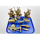 A group of heavy cast brass figures of Viking warriors,