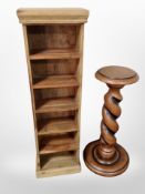 A contemporary mangowood narrow CD shelf and a torchere