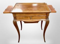 An early 20th century mahogany work table,