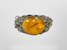 A silver amber cuff bangle