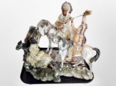 Four diecast Native American figures on horseback.