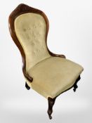 A Victorian walnut framed nursing chair,