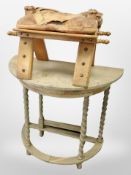 A blonde oak gate leg table and a camel stool
