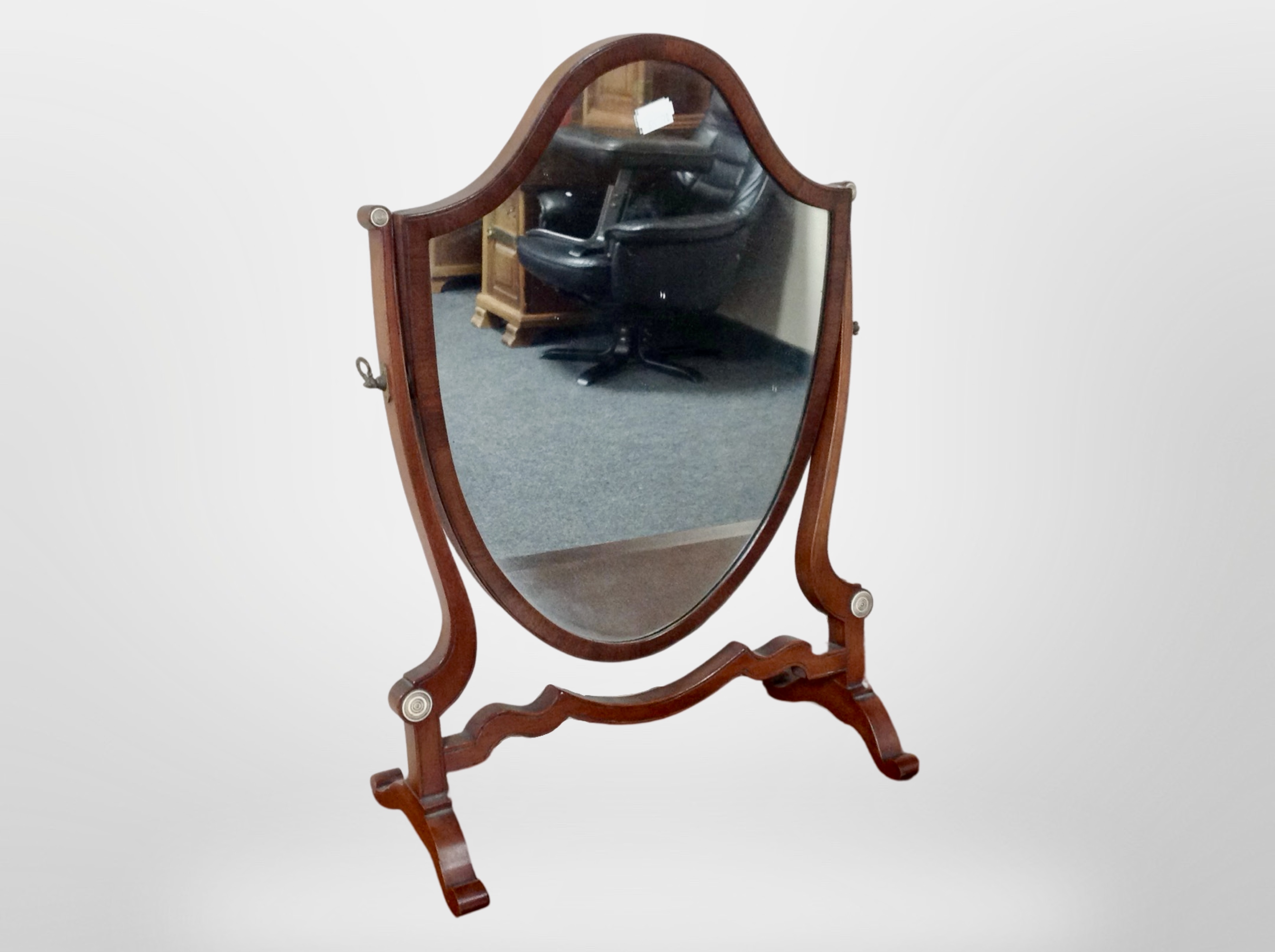 A mahogany shield shaped dressing table mirrror,