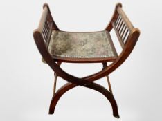 A Victorian X-framed stool with tapestry seat and a further inlaid mahogany corner armchair