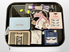 A group of new retail stock items - Pro-clean car cleaner, River Island wallets,