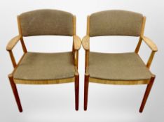 A pair of 20th century oak framed armchairs