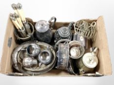 A box of antique silver-plated wares including teapots swing-handled basket, wine coaster, cutlery,