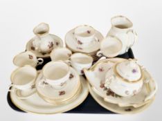 Approximately 29 pieces of KPM floral-decorated tea china.
