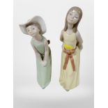 Two Lladro figures of girls.