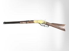 An ornamental lever-action rifle.