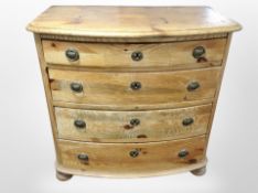 A 19th century Scandinavian pine bow fronted four drawer chest,