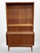 A 1970's Danish teak open bookcase,