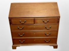 A 20th century mahogany fall front writing bureau,