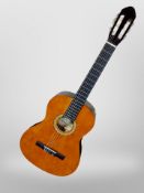 A Sheffield classical guitar with soft carry bag