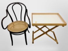 A Scandinavian beech tray on folding stand and a ebonised bentwood chair
