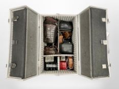 A metal case of camera equipment and cameras including Rollei and Zeiss etc