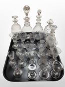 A group of early 20th century decanters and drinking glasses.