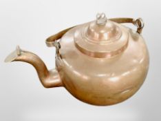 A oversized copper teapot, length 52cm.